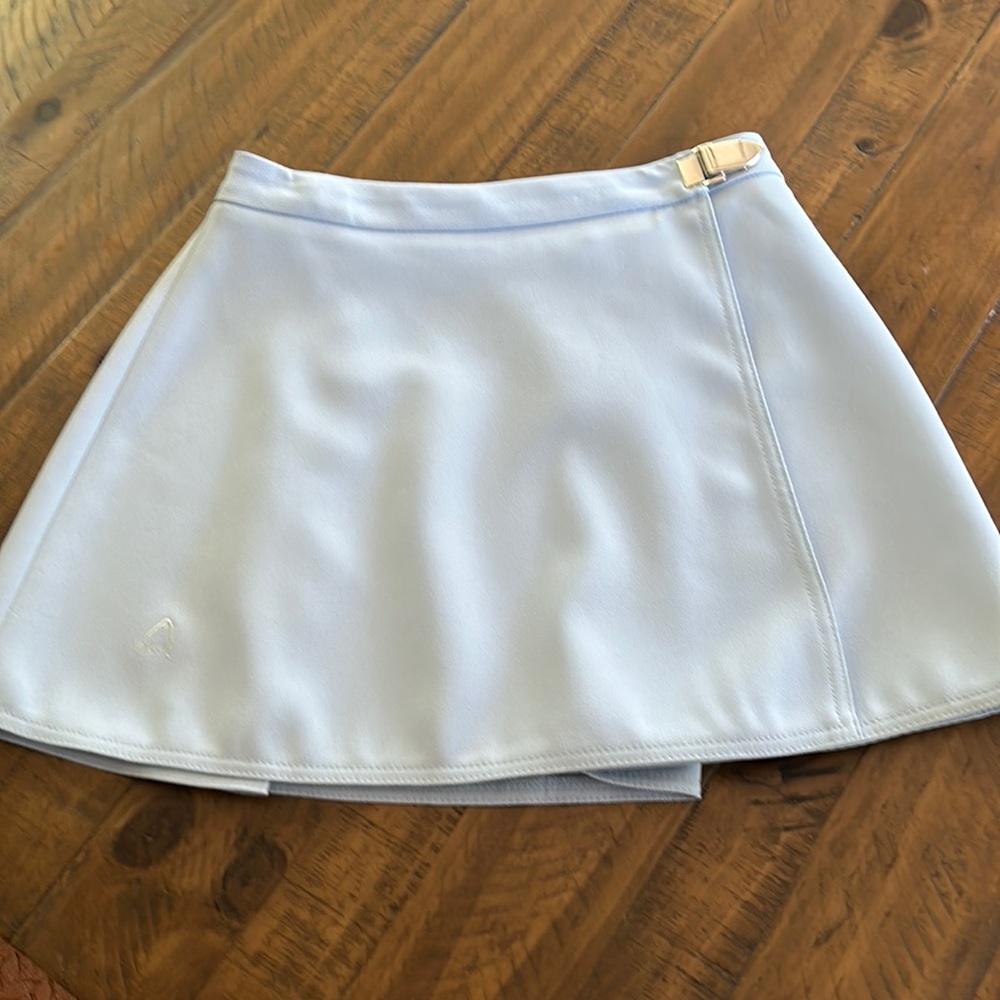 HEAD light blue tennis skirt.  Size 10.  Made in U.S.A.  Excellent condition.